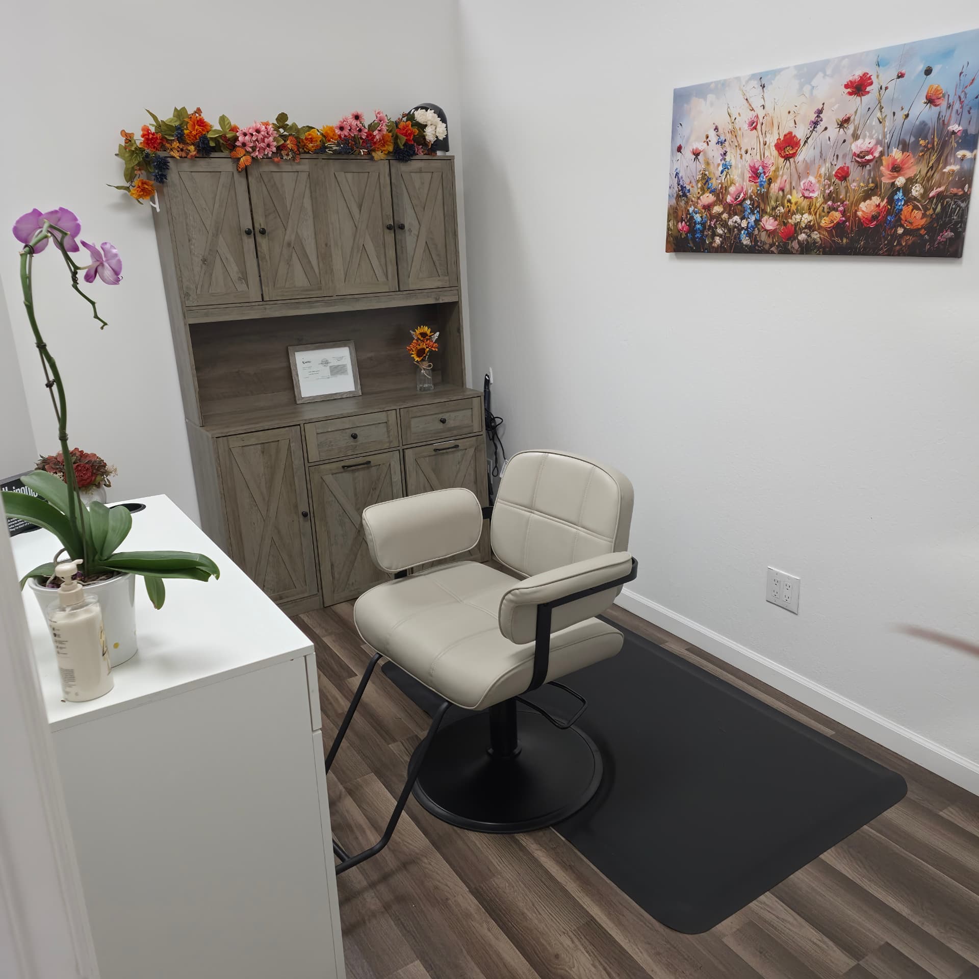 Tammy's studio suite with styling chair and wildflower canvas
